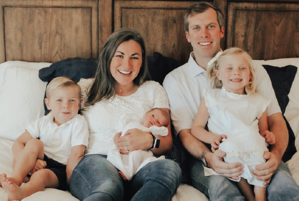Jay ’11 and Brittany ’11 Trumbull with their three children, Tripp (3), Merritt (4) and Emery, who was born in January 2022.