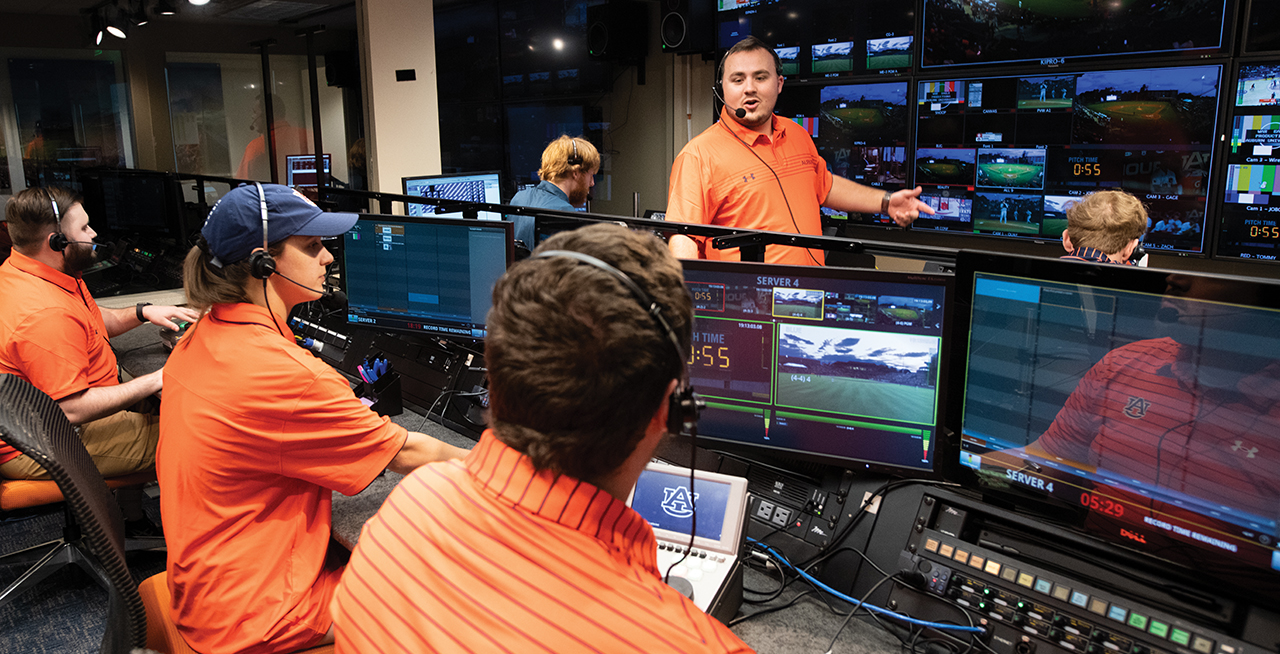 Staff working in War Eagle Productions control room during game
